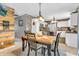 Charming dining area with rustic wood table, chairs and brick walls at 3637 Newberry Rd, Plainfield, IN 46168