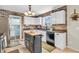 Well-appointed kitchen featuring white cabinetry, and modern fixtures at 3637 Newberry Rd, Plainfield, IN 46168