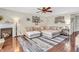 Inviting living room with fireplace, decorative rug, and a comfortable sectional at 3637 Newberry Rd, Plainfield, IN 46168
