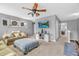 Comfortable living room features a TV, soft carpet, and view of a hallway leading to other rooms at 3637 Newberry Rd, Plainfield, IN 46168