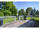 Backyard featuring a deck and trees at 3816 Cologne Ct, Indianapolis, IN 46228