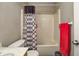 This bathroom features a bathtub with curtain and a single sink at 3816 Cologne Ct, Indianapolis, IN 46228