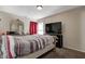 Cozy bedroom with a large window, providing ample natural light and a relaxing atmosphere at 3816 Cologne Ct, Indianapolis, IN 46228