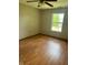 Bedroom with laminate flooring and natural light from a large window at 39 Meadow Creek East Blvd, Whiteland, IN 46184