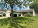 Well-maintained ranch style home with mature tree and landscaping at 39 Meadow Creek East Blvd, Whiteland, IN 46184