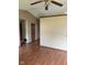 Living room with laminate flooring, ceiling fan, and neutral walls at 39 Meadow Creek East Blvd, Whiteland, IN 46184