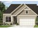 Charming single-Gathering home with a two-car garage, beautiful windows, and manicured landscaping at 3906 Holly Brook Dr, Westfield, IN 46074