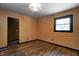 Bedroom features a hardwood floor and hanging light at 436 N 500 W, Anderson, IN 46011
