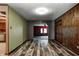 Open floor plan displaying hardwood floors and a view into an adjacent living space at 436 N 500 W, Anderson, IN 46011