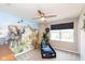 A whimsical room with a playful animal-themed mural and a race car bedframe at 4642 Boyd Pl, Westfield, IN 46062