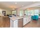 Modern kitchen featuring stainless appliances, quartz countertops, and an island with bar seating at 4642 Boyd Pl, Westfield, IN 46062
