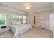 Relaxing main bedroom with a trey ceiling, large windows, and a serene atmosphere at 4642 Boyd Pl, Westfield, IN 46062
