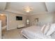 Serene main bedroom featuring a trey ceiling, large windows, and stylish furniture at 4642 Boyd Pl, Westfield, IN 46062