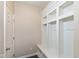 Mudroom with built-in cubbies, bench seating, and storage, offers convenient organization at 4642 Boyd Pl, Westfield, IN 46062