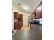 Bright kitchen with stainless steel appliances, dark cabinetry, and countertop with sink at 5019 Amber Creek Pl, Indianapolis, IN 46237