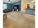 Open concept living room that connects to the kitchen and has a ceiling fan at 5019 Amber Creek Pl, Indianapolis, IN 46237