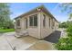Well maintained brick home featuring a concrete patio and manicured landscaping at 5274 Brooks Bnd, Greenwood, IN 46143