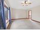 Large bedroom with carpet, trey ceiling, ceiling fan and window at 5274 Brooks Bnd, Greenwood, IN 46143