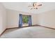 Large bedroom featuring carpet, trey ceiling, ceiling fan and large window at 5274 Brooks Bnd, Greenwood, IN 46143