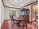 Formal dining room with hardwood floors, furniture, and natural lighting at 5274 Brooks Bnd, Greenwood, IN 46143