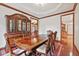Formal dining room with hardwood floors, furniture, and natural lighting at 5274 Brooks Bnd, Greenwood, IN 46143