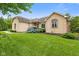 Beautiful brick home with lush green lawn and manicured landscaping at 5274 Brooks Bnd, Greenwood, IN 46143