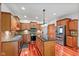 Updated kitchen with stainless steel appliances, granite countertops, and wood cabinets at 5274 Brooks Bnd, Greenwood, IN 46143