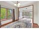 Bright living room featuring hardwood floors, windows with a view and a decorative rug at 5274 Brooks Bnd, Greenwood, IN 46143