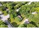 Beautiful home featuring a large, manicured lawn with mature trees and a long driveway in a suburban setting at 54 Horseshoe Ln, Carmel, IN 46033