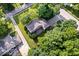 Aerial view of a well-maintained home boasting a large lot, mature trees, and a private backyard at 54 Horseshoe Ln, Carmel, IN 46033