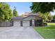Front exterior showcasing a well-maintained home with a two-car garage and appealing curb appeal at 54 Horseshoe Ln, Carmel, IN 46033