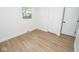 Bedroom with laminate flooring and closet at 5707 In-234, McCordsville, IN 46055