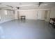 Spacious garage with epoxy floor, storage cabinets, and plenty of room at 5707 In-234, McCordsville, IN 46055