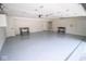 Spacious garage with epoxy floor, storage cabinets, and plenty of room at 5707 In-234, McCordsville, IN 46055