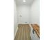 Laundry room with wood floors and butcher block counter, includes hookups at 5707 In-234, McCordsville, IN 46055