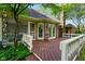 Inviting back deck with access to the home's interior and picturesque outdoor living space at 6118 Deerwood Dr, Greenwood, IN 46143