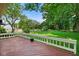 Expansive deck offers views of the lush backyard, ideal for outdoor gatherings at 6118 Deerwood Dr, Greenwood, IN 46143