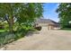 Exterior view of home showing the garage and driveway at 6118 Deerwood Dr, Greenwood, IN 46143
