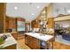 Gourmet kitchen with oversized island, and stainless steel refrigerator at 6118 Deerwood Dr, Greenwood, IN 46143