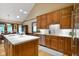 Bright kitchen with white countertops, stainless appliances and wood floors at 6118 Deerwood Dr, Greenwood, IN 46143