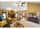 Comfortable living room featuring a brick fireplace and vaulted ceilings at 6118 Deerwood Dr, Greenwood, IN 46143