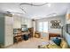 Bright office with custom built-ins, unique lighting and comfortable seating at 6118 Deerwood Dr, Greenwood, IN 46143