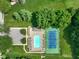 Overhead view of the community pool and tennis courts, perfect for recreational activities at 6118 Deerwood Dr, Greenwood, IN 46143