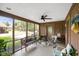 Inviting screened porch, ideal for relaxing and enjoying the outdoors at 6118 Deerwood Dr, Greenwood, IN 46143