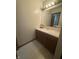 Bathroom with vanity, sink, mirror and overhead lighting at 613 Monte Vista Dr, Greenwood, IN 46143