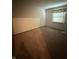 This bedroom offers a cozy atmosphere with carpeting and a bright window at 613 Monte Vista Dr, Greenwood, IN 46143