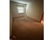 This bedroom features neutral walls, plush carpeting, and a window with blinds at 613 Monte Vista Dr, Greenwood, IN 46143