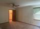 Spacious bedroom provides ample natural light and plush carpeting with walk-in closet at 613 Monte Vista Dr, Greenwood, IN 46143