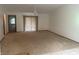 Large living room features carpet, a ceiling fan and a sliding glass door at 613 Monte Vista Dr, Greenwood, IN 46143