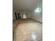 Bright and airy living room features plush carpet and large windows at 613 Monte Vista Dr, Greenwood, IN 46143